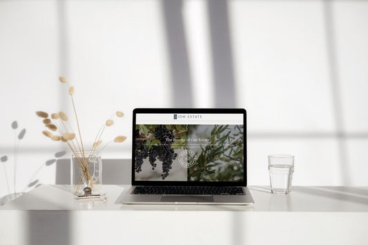 A mockup of a wine website on a laptop